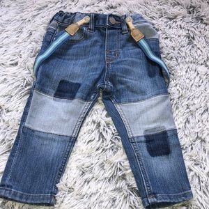 Patched jeans with suspenders